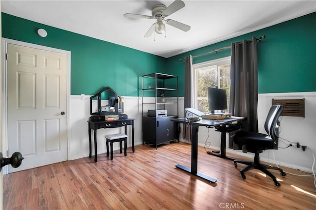 office space with hardwood / wood-style floors and ceiling fan