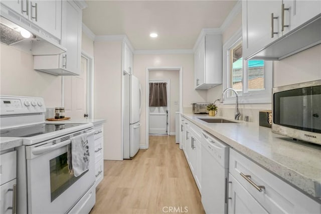 kitchen featuring sink, white cabinetry, light wood-type flooring, ornamental molding, and white appliances