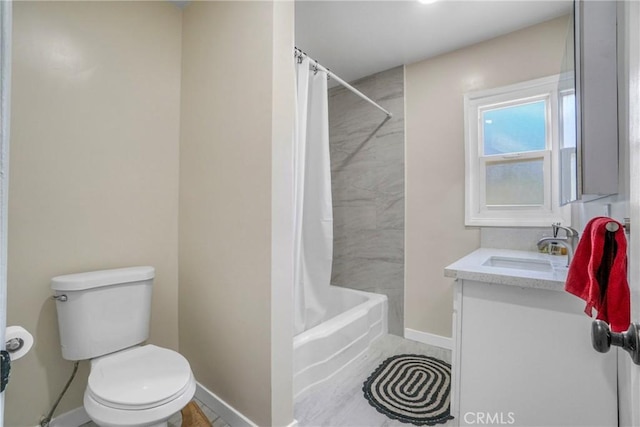 full bathroom with vanity, toilet, and shower / bath combo with shower curtain