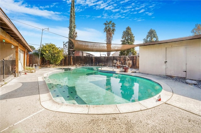 view of pool featuring a patio