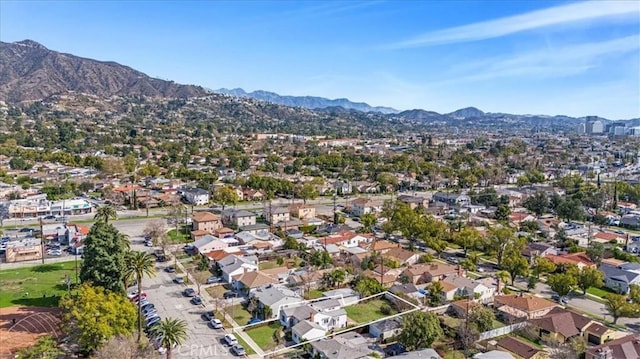 drone / aerial view featuring a mountain view