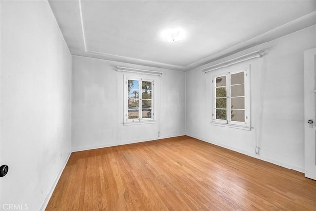 unfurnished room featuring light hardwood / wood-style flooring