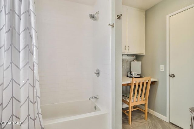 bathroom with shower / bathtub combination with curtain