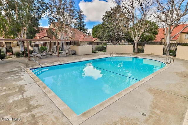 view of pool featuring a patio area