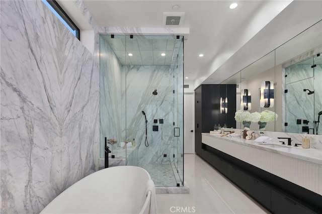 3011 Ocean Front Walk, Venice, CA 90291 - full bathroom with recessed lighting, visible vents, a soaking tub, vanity, and a marble finish shower