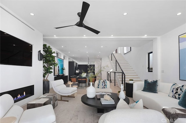 3011 Ocean Front Walk, Venice, CA 90291 - living area featuring a ceiling fan, stairway, recessed lighting, and a lit fireplace