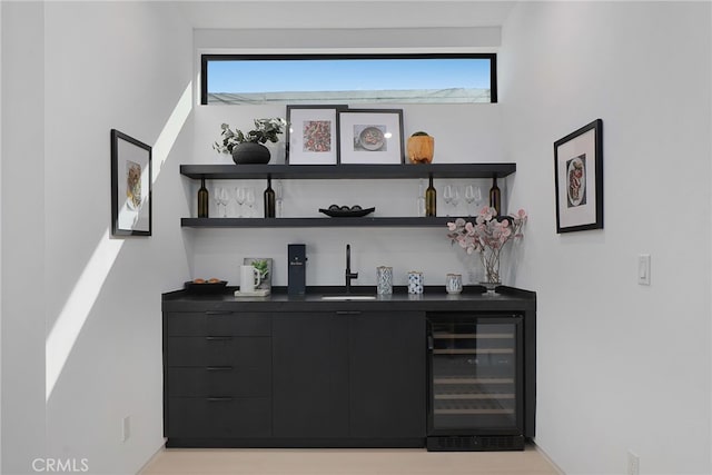 bar with wine cooler and sink