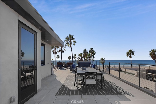 view of patio / terrace featuring a water view