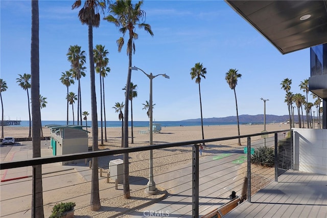 exterior space featuring a water and mountain view