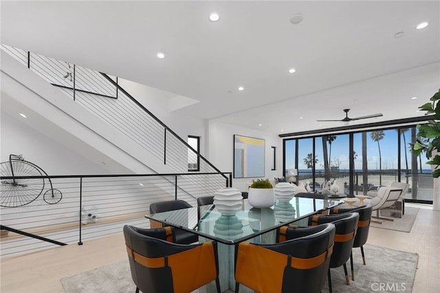 3011 Ocean Front Walk, Venice, CA 90291 - dining area with ceiling fan, recessed lighting, expansive windows, and wood finished floors