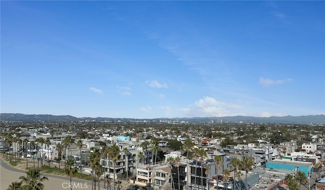 drone / aerial view featuring a mountain view