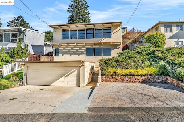 view of front of home with a garage