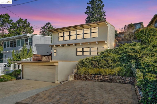 view of front of property with a garage