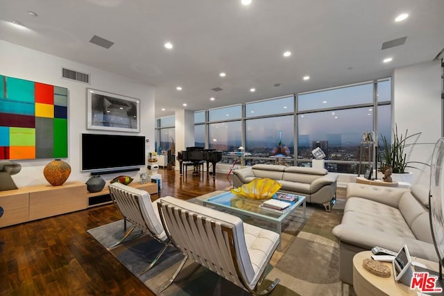 living room with expansive windows and wood-type flooring