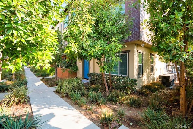 doorway to property with central AC