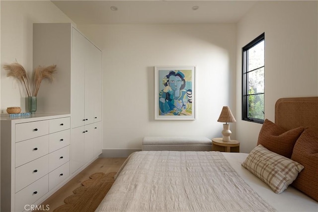 bedroom featuring light hardwood / wood-style flooring