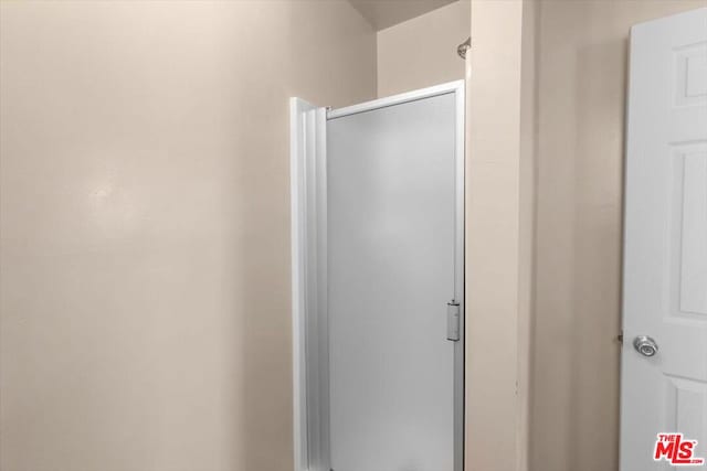 bathroom with a shower