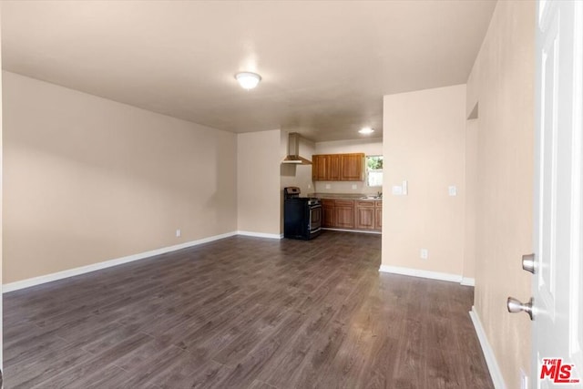 unfurnished living room featuring dark hardwood / wood-style flooring