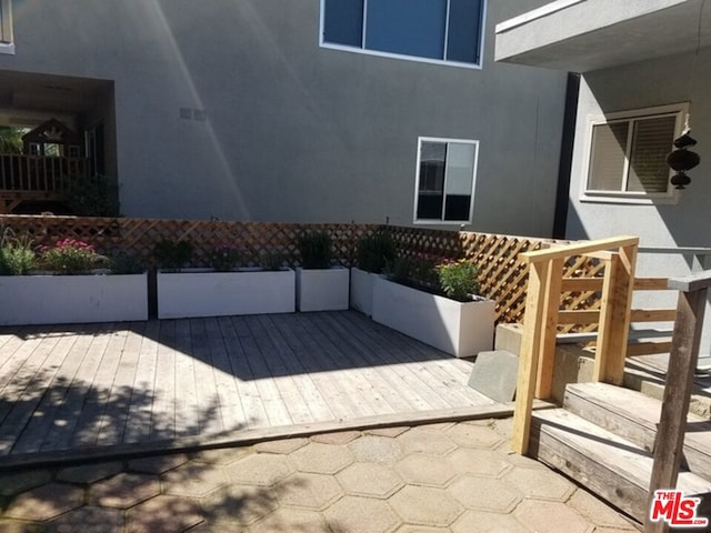 view of patio with a wooden deck