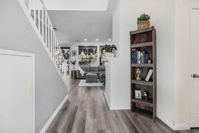 hallway with wood-type flooring