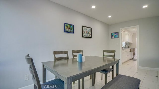 dining space with light tile patterned floors