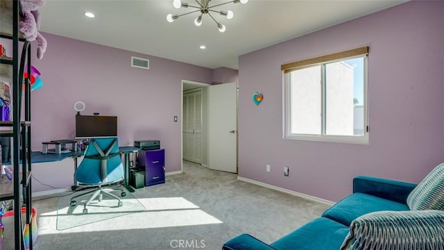 office space with light carpet and a notable chandelier