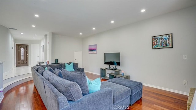 living room with hardwood / wood-style flooring