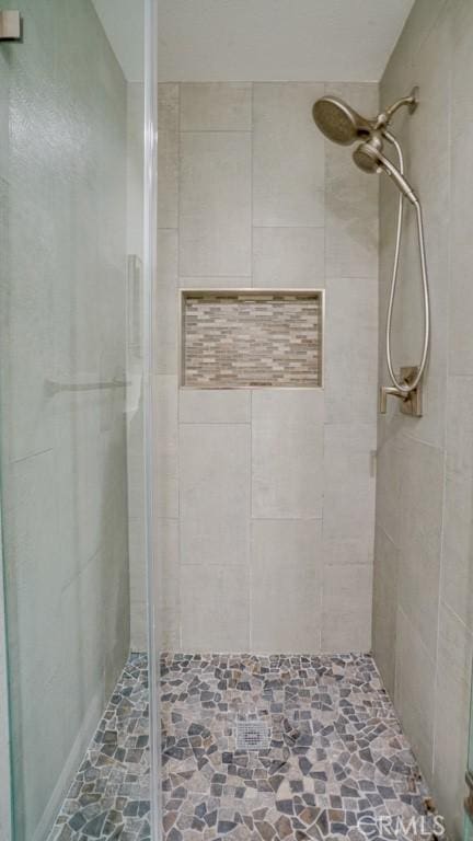 full bath featuring a stall shower