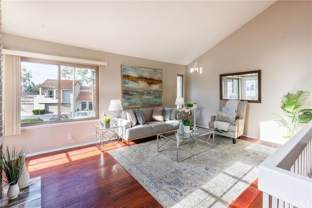 living room with lofted ceiling and hardwood / wood-style floors