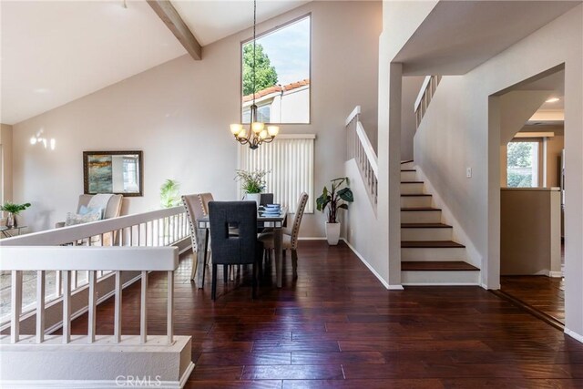 dining space with dark hardwood / wood-style floors, a chandelier, high vaulted ceiling, and beam ceiling