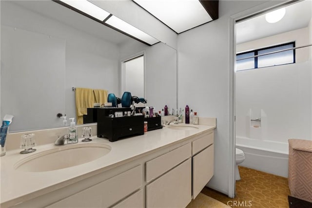 full bathroom with shower / bath combination, toilet, vanity, and tile patterned flooring