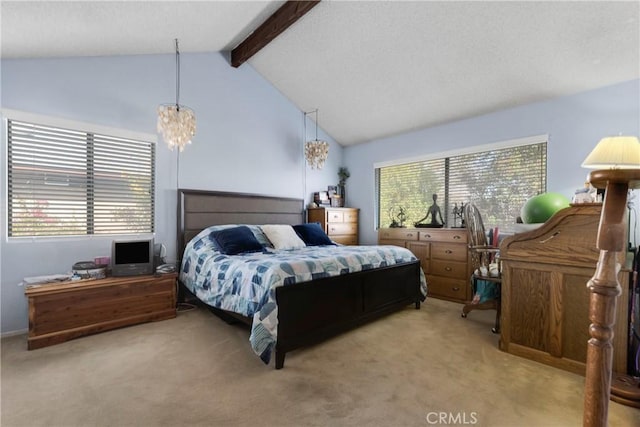 carpeted bedroom featuring lofted ceiling with beams