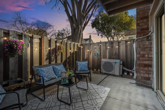 patio terrace at dusk with ac unit