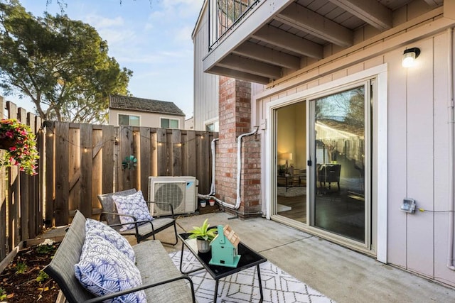 view of patio / terrace featuring ac unit