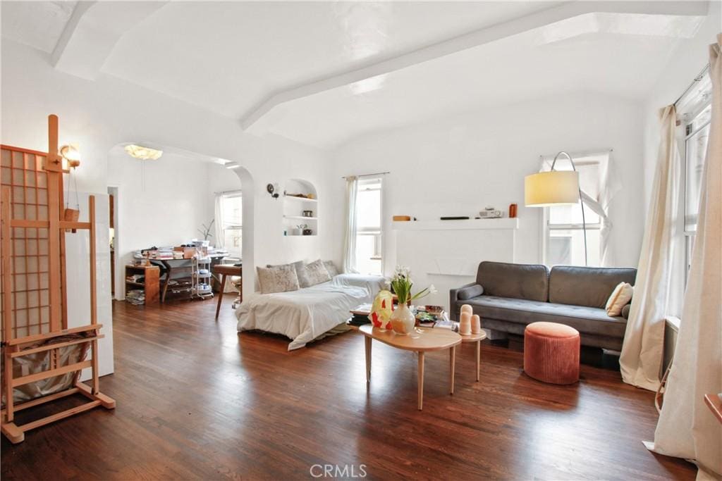 3206 W 43rd Pl, Los Angeles, CA 90008 - living room with built in shelves, dark wood-type flooring, and beamed ceiling