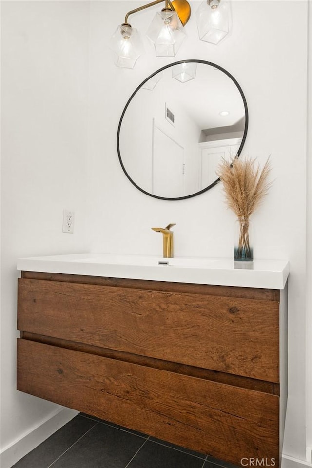 bathroom featuring vanity and tile patterned flooring