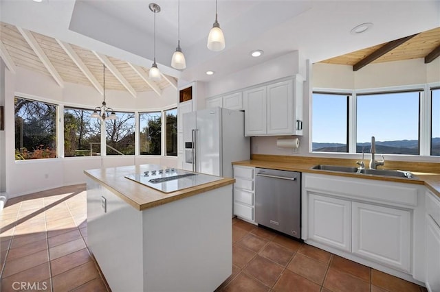 kitchen with white cabinets, dishwasher, wood ceiling, and high end fridge