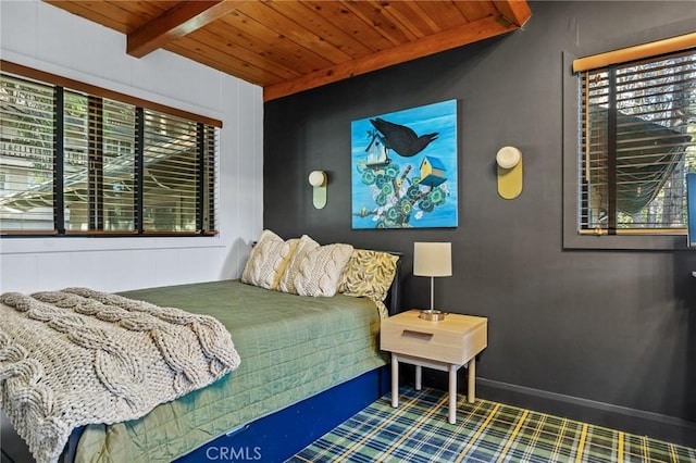 bedroom with wooden ceiling and beamed ceiling