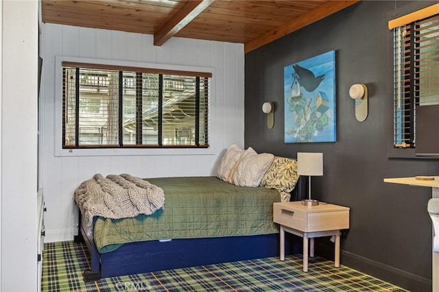 bedroom featuring wooden ceiling and beamed ceiling