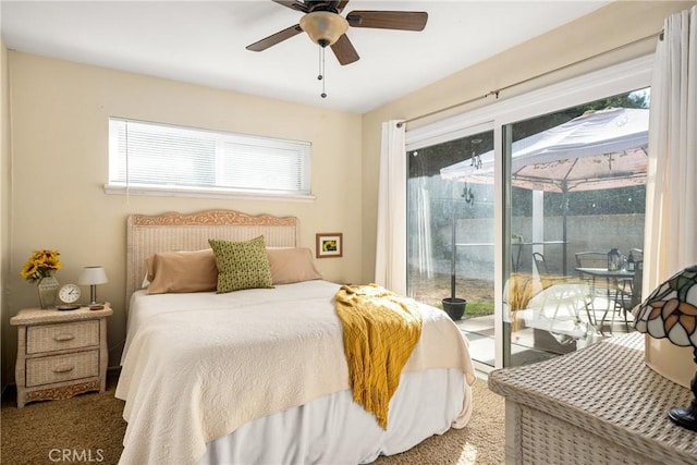 bedroom with access to exterior, ceiling fan, and carpet flooring