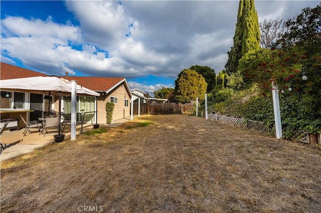 view of yard with a patio area