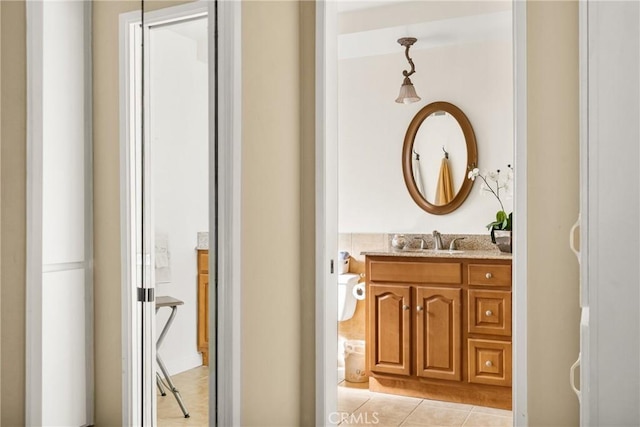 bathroom with vanity and tile patterned floors