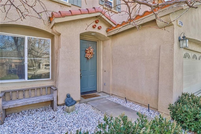 property entrance featuring a garage