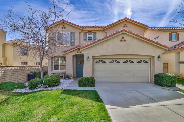 mediterranean / spanish house with a front lawn