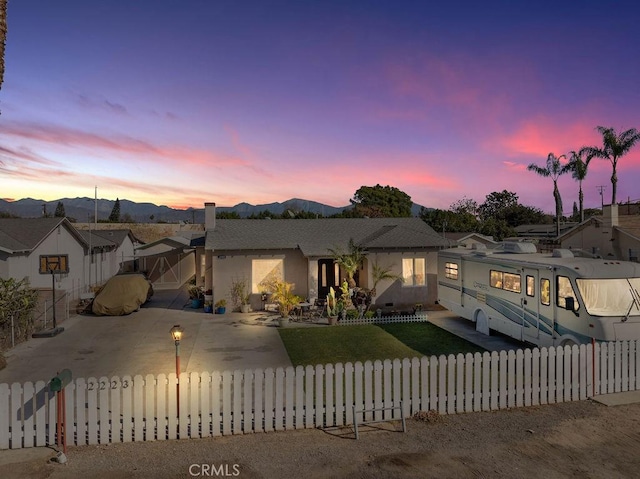 view of front of home with a mountain view