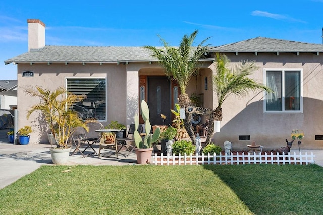 exterior space with a patio area and a front yard