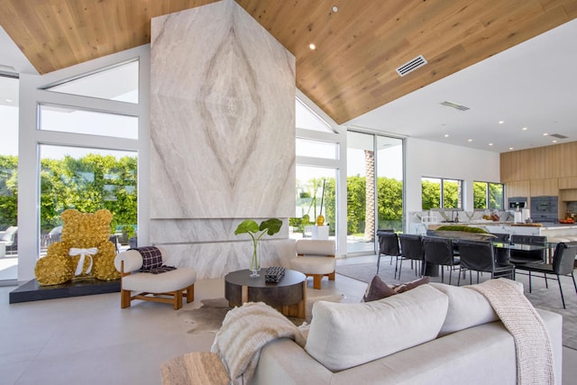 sunroom featuring wooden ceiling