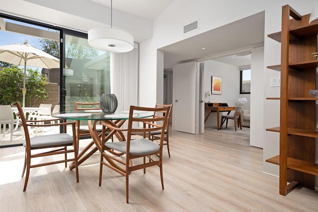 dining room featuring light hardwood / wood-style floors