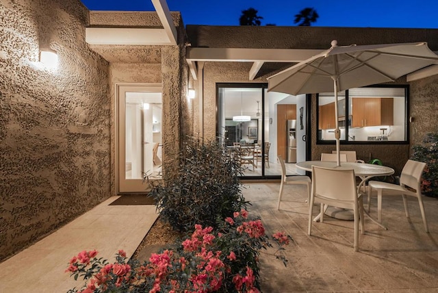 view of patio at night