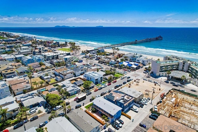 drone / aerial view with a view of the beach and a water view